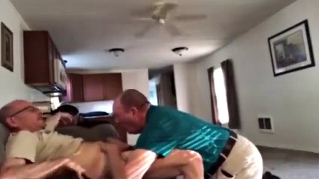 Clothed grandpa on his knees sucking daddy's cock