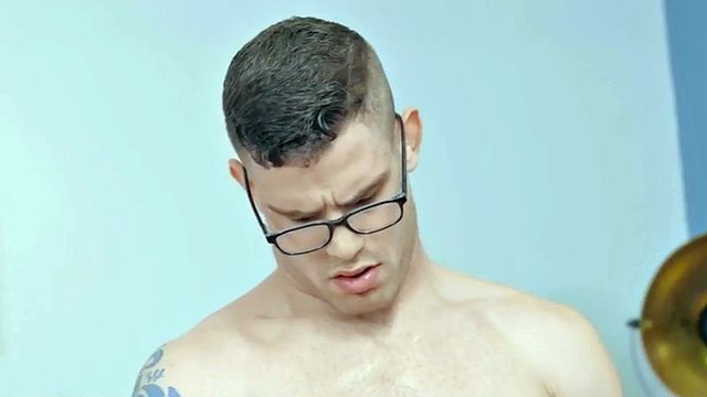 Muscular jock masturbator cums on his face when he reaches the end