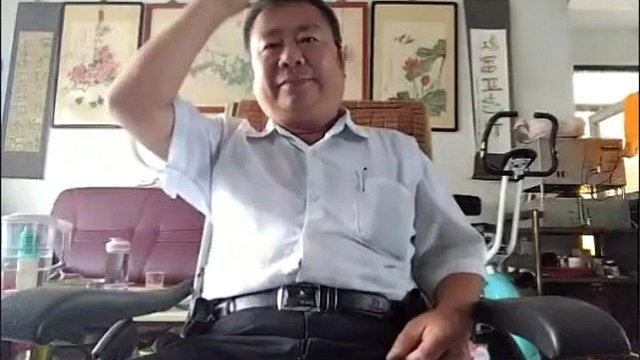 Cute Chinese dad on webcam