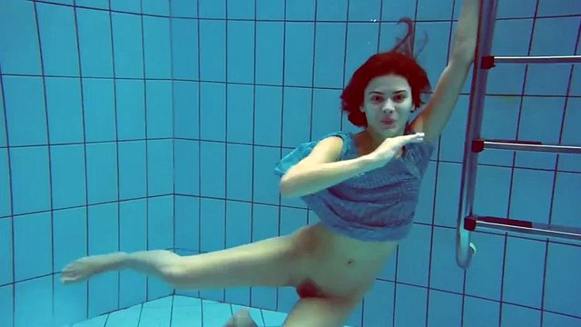 Beautiful redhead hairy pussy underwater