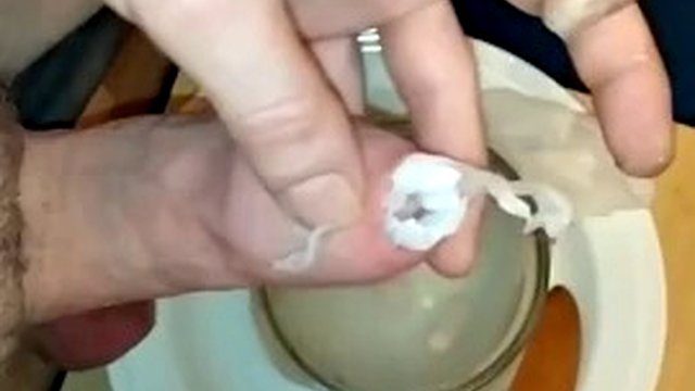 Dip cock in hot wax