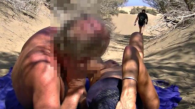 Kone på stranden