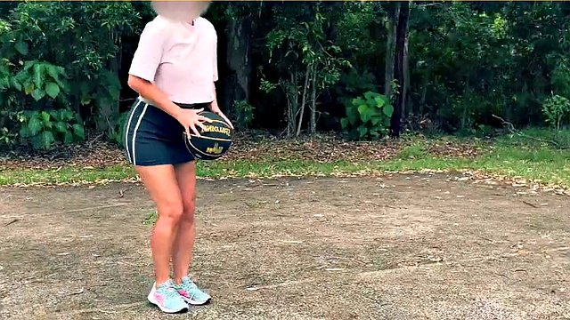 The wife dares to play basketball without bra and panties in a short skirt.
