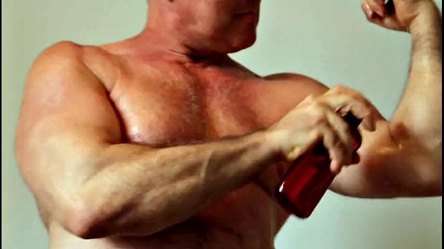 Fitness muscular sport daddy bodybuilder Studio bizeps strong man weightlifter oil massage fit