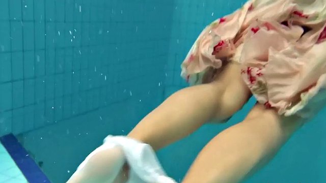 lucy takes the dress off showing her hairy pussy and titties underwater