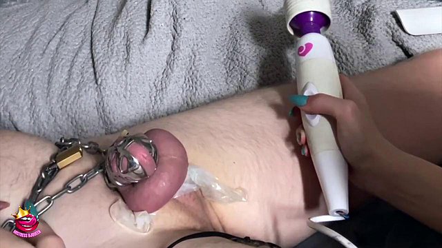 Mistress BJQueen Milks Chastity Cage Into Condom Cum