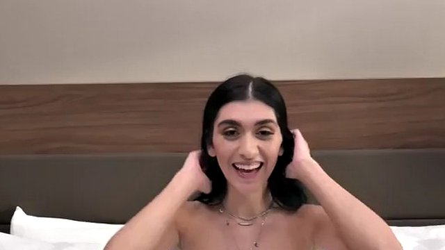 Tall brunette teen with 36DD boobs makes her porn debut