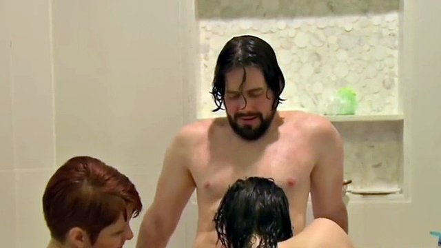 this horny couple is having a sexy swinger threesome while taking a hot shower