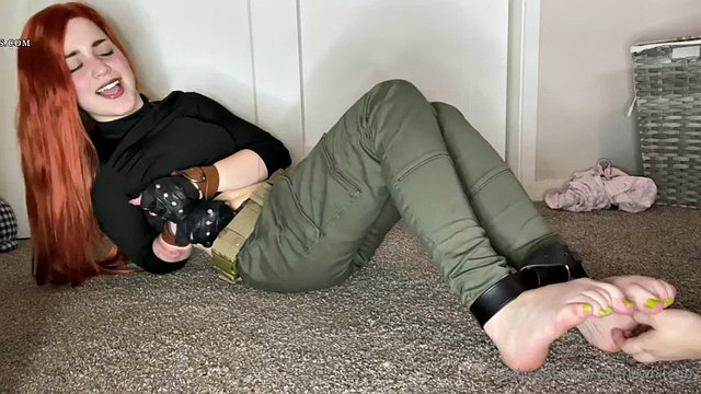 Kim's feet tickled