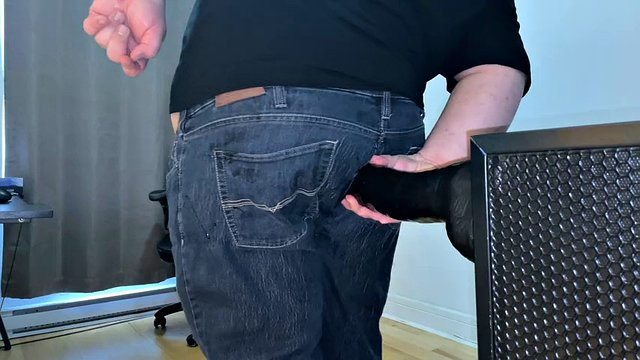 Fully clothed superchub rides a dildo