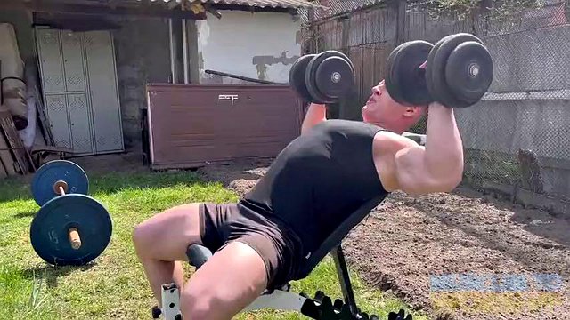 Roided Muscle Bodybuilder Pumps Up in Backyard