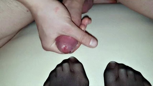 Black nylon stocking on wife's French toenails covered in detail by a big load of cum