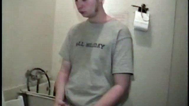 This guy from next door spreads his new porn magazine on the washing machine and pulls his cock out from under the fly of his baggy shorts without even letting his balls play.