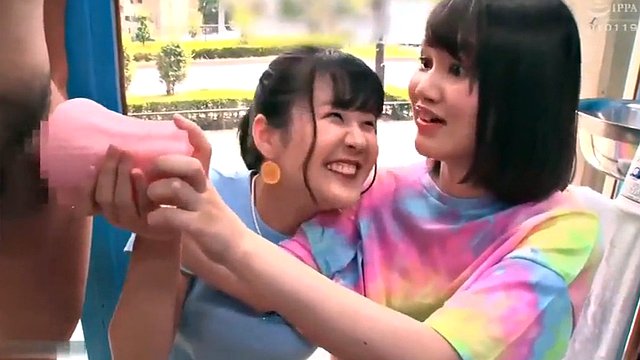 Shy Japanese beauties give handjob cumshot to stranger in glass room