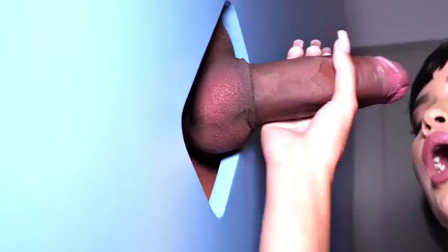 Bigass TS babe sucks cock in glory hole in amateur closeup BJ