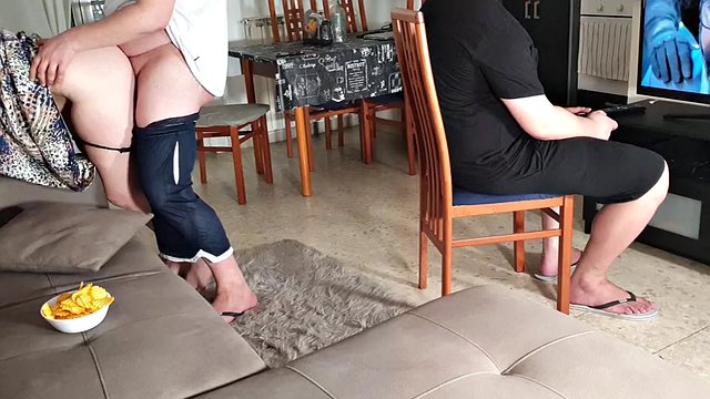 His friend fucks me while he plays playstation